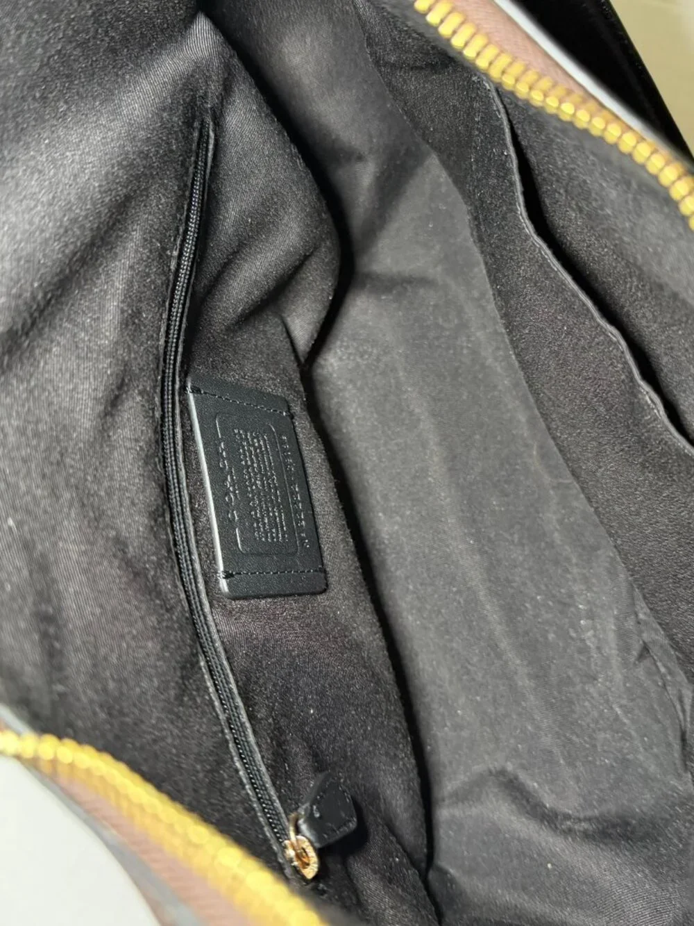 Coach Jules Hobo in Signature Canvas